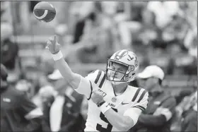  ?? AP/GERALD HERBERT ?? LSU quarterbac­k Joe Burrow warms up before a game against Auburn on Saturday in Baton Rouge, La.