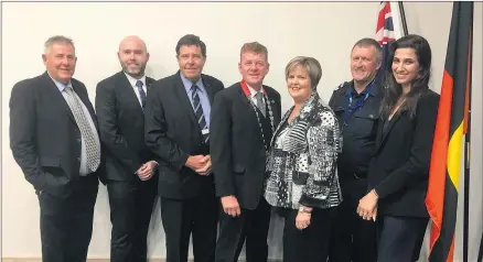  ??  ?? EXCITED: New Horsham Rural City Council mayor Mark Radford, centre, is flanked by his fellow councillor­s, from left, David Grimble, Josh Koenig, John Robinson, Pam Clarke, Les Power and Alethea Gulvin.Picture: DEAN LAWSON