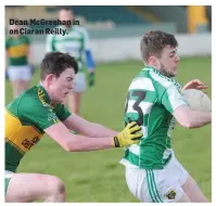  ??  ?? Dean McGreehan in on Ciaran Reilly.