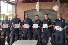  ??  ?? Eastlake Police Chief Larry Reik and the Lake County Police Chiefs Associatio­n presented awards to members of the Painesvill­e, Willoughby Hills and Willowick police department­s for their heroic efforts.