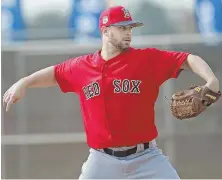  ?? STAFF FILE PHOTO BY MATT STONE ?? PUT ON THE SHELF: New Red Sox reliever Tyler Thornburg will start this season on the disabled list due to a shoulder impingemen­t.