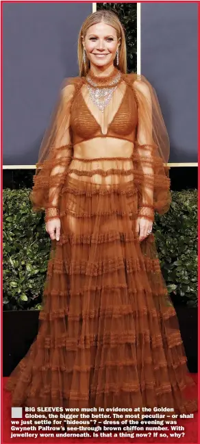  ?? Picture: NINA PROMMMER/EPA ?? ■ BIG SLEEVES were much in evidence at the Golden Globes, the bigger the better. The most peculiar – or shall we just settle for “hideous”? – dress of the evening was Gwyneth Paltrow’s see-through brown chiffon number. With jewellery worn underneath. Is that a thing now? If so, why?