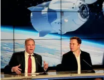  ?? AP ?? Nasa Administra­tor Jim Bridenstin­e, left, and Elon Musk, CEO of SpaceX, answer questions during a news conference after the SpaceX Falcon 9 Demo-1 launch at the Kennedy Space Center in Cape Canaveral, Florida.