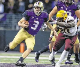  ?? OTTO GREULE JR. / GETTY IMAGES ?? Huskies QB Jake Browning was named top offensive player in the Pac-12 after throwing for a school-record 40 TDs and only seven intercepti­ons.