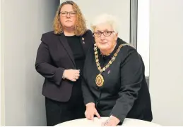  ??  ?? Poignant moment Provost Jones and Councillor Heather Brannan-McVey sign the Stockholm Declaratio­n