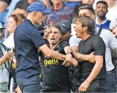 ?? Picture: AFP ?? HEATED STUFF. Tottenham Hotspur manager Antonio Conte (right) and his Chelsea counterpar­t Thomas Tuchel didn’t see eye to eye during their 2-2 draw on Sunday.