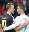  ??  ?? Henry Kane (left) and Cristiano Ronaldo