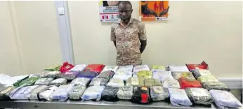  ?? ?? Above and right: Adinnu Felix Chinedu allegedly admitted that he usually transporte­d drug consignmen­ts to a warehouse in Ayobo, Lagos, for onward distributi­on.