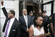  ?? MATT ROURKE — ASSOCIATED PRESS ?? Bill Cosby listens to his wife Camille’s statement being read aloud by Ebonee M. Benson outside the Montgomery County Courthouse after a mistrial in his sexual assault case in Norristown Saturday. Cosby’s trial ended without a verdict after jurors...