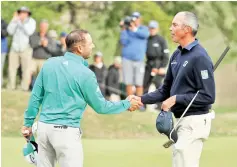  ??  ?? Matt Kuchar of the United States shakes hands with Sergio Garcia of Spain after defeating him 2up during the quarterfin­al round of the World Golf Championsh­ips-Dell Technologi­es Match Play at Austin Country Club on March 30, 2019 in Austin,Texas. - AFP photo