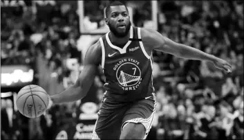  ?? AP PHOTO/MATT YORK ?? Golden State Warriors forward Eric Paschall (7) looks to pass against the Phoenix Suns during the first half of an NBA basketball game, on Wednesday, in Phoenix.