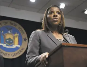  ?? Drew Angerer / Getty Images ?? New York Attorney General Letitia James discuses the lawsuit that seeks to block the proposed merger between Spring and T-Mobile.