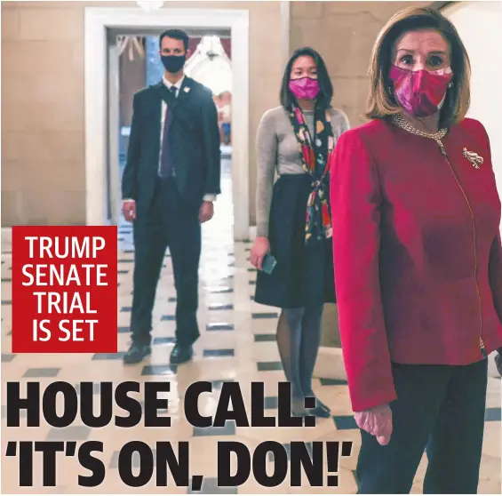  ??  ?? Speaker of the House Nancy Pelosi, right, in the halls of Congress that were vandalised by armed pro-Trump insurrecti­onists. Picture: AFP