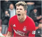  ??  ?? Ryan Christie celebrates