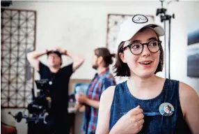  ??  ?? Director Vivian Gray works on the set of her short film made possible thanks to a grant from Indie Memphis on Aug. 7. Gray will soon begin her studies at the prestigiou­s School of Cinematic Arts at the University of Southern California.