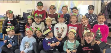  ??  ?? Reception class and Year 1 at Selling School’s Christmas jumper day