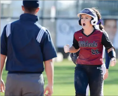 ?? MATT BATES — ENTERPRISE-RECORD FILE ?? Chico State’s Kristin Worley celebrates after ripping a double against Cal State Monterey Bay on Saturday, Feb. 8, at University Softball Field in Chico.