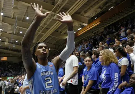  ?? Jared C. Tilton / Getty Images ?? Caleb Love and North Carolina defeated Duke on the road in Cameron Indoor Stadium March 5 in the teams’ regularsea­son finale. It was arguably the most anticipate­d game of the season ... until now.