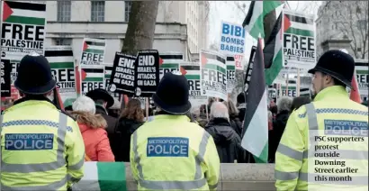 ?? PHOTO: PA ?? PSC supporters protest outside Downing Street earlier this month