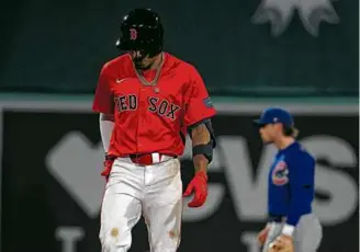  ?? BARRY CHIN/GLOBE STAFF ?? Ceddanne Rafaela (0 for 4) flied to center field for the final out as the Red Sox dropped the opener of a three-game series against the Cubs.