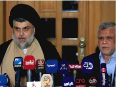  ?? — Reuters photo ?? Sadr speaks during a news conference with Amiri in Najaf, Iraq.