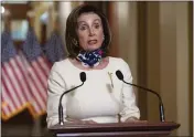  ?? SAUL LOEB — POOL VIA AP ?? House Speaker Nancy Pelosi speaks about the more than $3trillion coronaviru­s aid package unveiled on Tuesday on Capitol Hill in Washington.