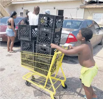  ?? MATT SEDENSKY/AP ?? Christoper Williams, 5, and his two brothers are out of school after Hurricane Ida left schools shuttered.