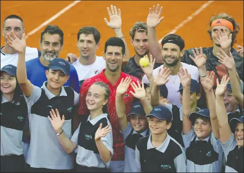  ?? — REUTERS ?? Novak Djokovic, centre, announced earlier this week that he and his wife tested positive for the coronaviru­s after he played a series of matches in Serbia and Croatia with no social distancing.