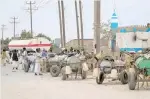  ?? — AFP ?? People refill donkey-drawn water tanks during a water crisis in Port Sudan in the Red Sea State of Sudan.