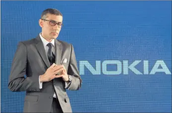  ?? PHOTO: BLOOMBERG ?? Rajeev Suri, the chief executive of Nokia, is in advanced talks to acquire French rival Alcatel-Lucent.