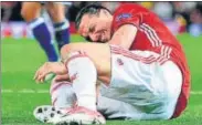  ?? AFP PHOTO ?? Manchester United's Zlatan Ibrahimovi­c reacts after getting injured during the Europa League match Anderlecht on Thursday.