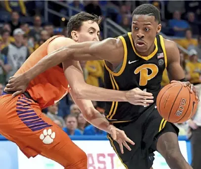  ?? Matt Freed/Post-Gazette ?? Sophomore guard Xavier Johnson’s performanc­e — 0-for-9 from the field — typified the Panthers’ struggles in a 72-52 loss to Clemson Wednesday night at Petersen Events Center.