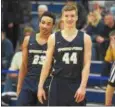  ?? AUSTIN HERTZOG - DIGITAL FIRST MEDIA ?? Spring-Ford’s Noah Baker, left, and Austin Hokanson smile with one another in the late stages of the Rams’ PAC playoff win over Phoenixvil­le Tuesday at Pottstown.