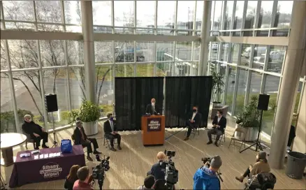  ?? PHOTO PROVIDED ?? SUNY Chancellor Malatras, SUNY Upstate President Mantosh Dewan, Albany County Exec Dan McCoy, and others inside Albany Internatio­nal Airport.