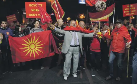  ?? Reuters ?? Protesters who boycotted Macedonia’s name-change referendum shout slogans in the capital Skopje on Sunday