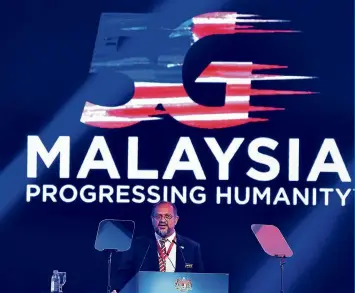  ?? — Bernama ?? Gobind delivering a speech at the launch of the first 5G Malaysia showcase in Putrajaya.