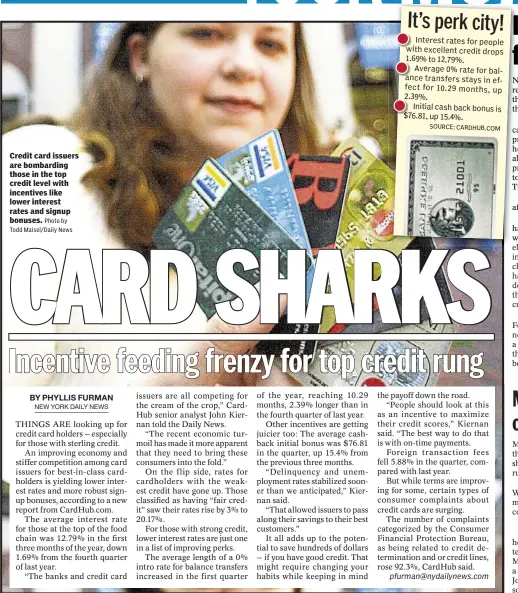  ?? Photo by Todd Maisel/daily News ?? Credit card issuers are bombarding those in the top credit level with incentives like lower interest rates and signup bonuses.