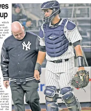  ?? Bill Kostroun ?? CAN’T CATCH A BREAK: Gary Sanchez leaves the game after cramping up in the top of the 14th inning after catching 252 of the 265 pitches thrown by the Yankees in a loss to the Orioles on Friday.