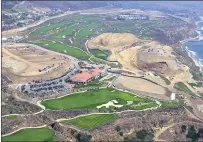  ?? STAFF FILE PHOTO ?? Aerial view of the Ocean Trails golf course looking east, and the continuing repairs following the 1999 landslide, center right, in 2001.