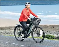  ??  ?? New world: Veronica Henry enjoying her new e-bike