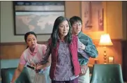  ?? Allyson riggs/a24/Tns ?? From left, Stephanie Hsu, Michelle Yeoh and Ke Huy Quan in “Everything Everywhere All at Once.”