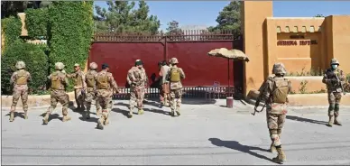  ?? Photo: AFP ?? Paramilita­ry soldiers patrol outside the Serena hotel, which was hosting the Chinese ambassador, a day after a deadly suicide blast in Quetta on Thursday.