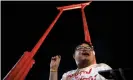  ??  ?? Parit Chiwarak, a pro-democracy student, talks to the media at the Giant Swing. Photograph: Soe Zeya Tun/Reuters