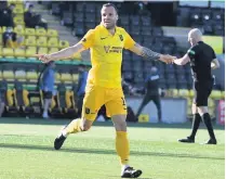  ??  ?? POP IDOL
Matej Poplatnik celebrates his winner for Livingston