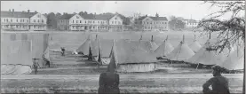  ?? Contribute­d ?? Barnhardt Circle, circa 1917, showing cantonment­s on the parade ground and troop barracks.