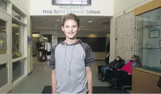  ?? GREG SOUTHAM ?? Ryan Kucy, 13, is at Edmonton’s Holy Spirit Catholic School, which shares a location and joint-use facilities with Lakeland Ridge Public School. The schools were built 13 years ago and are considered a success.