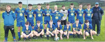  ?? ?? Mossy Moore of The Latch restaurant presenting a set of jerseys to Brideview Utd prior to their game on Saturday last.