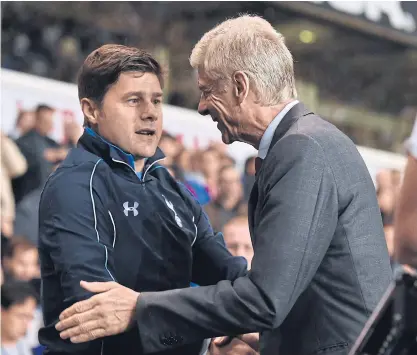  ??  ?? Tottenham manager Mauricio Pochettino, left, and Arsenal boss Arsene Wenger.