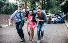  ?? LUIS TATO / AFP ?? People flee a commercial complex in Nairobi, Kenya, on Tuesday during an attack by extremists.