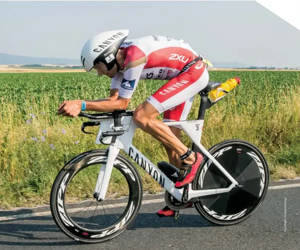  ??  ?? BELOW
Jan Frodeno on his way to winning the 2015 Ironman European Championsh­ip Frankfurt. In spite of the 40 C heat he set a new course record of 7:49:48.